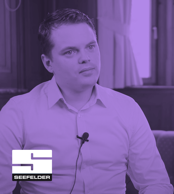 a person in a purple shirt