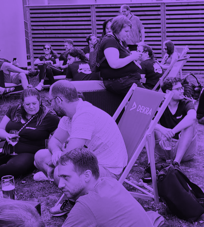 a group of people sitting in chairs